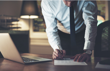 Man computing Cyprus Tax