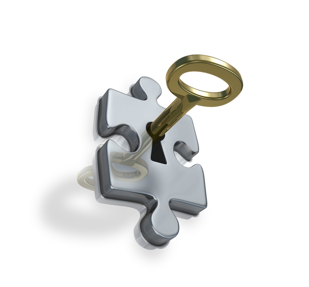 Golden Key on a Puzzle piece