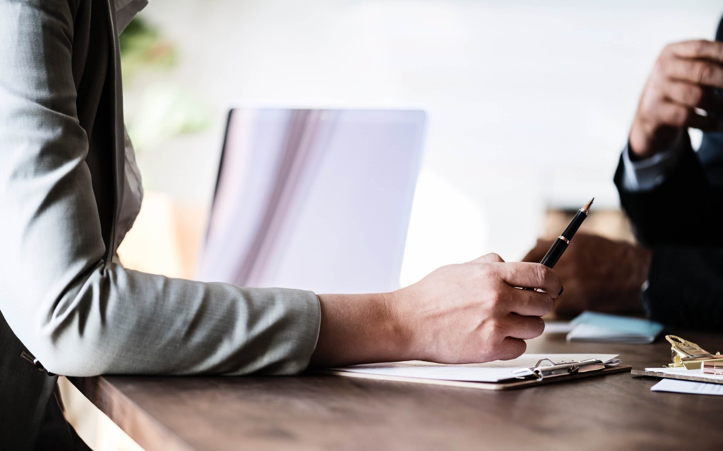 Tax consultants explaining a document to the business owner